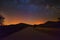 Starry sky over a country road