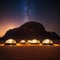 Stars above martian dome tents in Wadi Rum