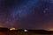 Stars sky night over camping tourist site, desert Israel.