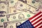 The stars and stripes with dollar bills of the USA. Vintage, retro look. Money, cash background. Financial concept.