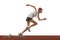 Start. Beginner female track runner bursting off starting block isolated over white background. Sport, workout, skills