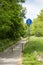 start of a cycle path with traffic signs and bollards in Saxony, Germany