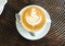 Start The Day with Fresh Coffee Concept. Top View A Cup of Art Latte with Tree Floral Design Style on Cappuccino Coffee