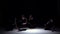 Start graceful contemporary dance of four dancers on black, shadow, slow motion