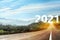 Start new year with fresh vision and ideas. Asphalt road leading to 2021 numbers