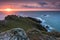 Start Point lighthouse at sunrise in Devon, UK