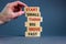 Start small think big symbol. Words `Start small think big move fast` on wooden blocks on a beautiful grey background. Businessm