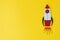 Start up business concept. Boost or increase incomes, salary. Drawn rocket on colorful yellow background. Copy space