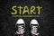 Start, word on the asphalt road. Sneakers. View from above. Success concept. Business. Life style.