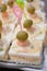 Starter food canape with tuna fish mayonnaise shrimps oliva appetizer food gourmet