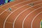 Starting blocks on track line on indoor arena