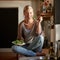 She always starts her day with the freshest ingredients. Full length shot of a young woman eating a bowl full of leafy