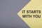 IT STARTS WITH YOU text on gray-yellow background