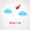 Startup concept with colorful paper aeroplane in low poly design