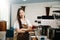 Startup successful small business owner sme woman stand with tablet in cafe. woman barista cafe owner