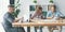 Startup talking, meeting, discussing, brainstorming together while sitting at wooden working desk