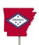 State of Arkansas road sign in the shape of the state map with the flag