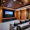 A state-of-the-art home theater with plush reclining seats, a large projection screen, and a surround sound system for an immers