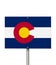 State of Colorado road sign in the shape of the state map with the flag
