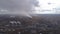 State district power station aerial view. Steam comes from a high factory chimney.