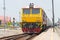 State Railway of Thailand Diesel electric locomotive 4226 hauls a train in Ayutthaya Railway station, Ayutthaya, Thailand