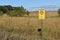 State Wildlife Management Area open to Public Hunting - Minnesota Department of Natural Resources DNR sign with open prairie in