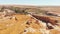 Static aerial view tourist groups walk around historical landmark antique city mesopotamia ruins