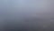 Static drone shot of fog surrounding Pismo Beach pier