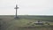 Static frame views of the ancient cross and sundial