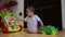 Static shot, cute seven months old baby boy playing with educational toys on the floor happy childhood,early development