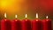 Static shot of five burning red xmas candles on blurry background