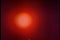 Static shot of a red hot sun