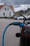 A static shot of a solid black Tesla Model 3 dual motor charging at the Sandefjord municipality AC