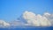 Static time-lapse view Wide Angle puffy cumulus burst Cloudscape Timelapse From Below over mountains