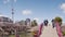 Static video of Tokyo Skytree Tower and Kameido Tenjin shrine`s red Taiko bridge