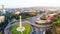 Static view automobiles in traffic on roundabout in Tbilisi center. Square of heroes monument