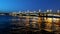 Static view of night St. Petersburg steel bridge, drawbridge. Media. Neva river scenic backlight reflection. Road