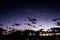 Station at sunset. The bridge over the railway. Beautiful landscape at sunset.