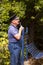 A station worker wearing traditional railway worker overalls