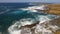 Stationary Aerial View North Shore Beach Waves Rocks Surf