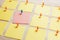 Stationary, Blank Colored Sticker Pined on White Wooden Board. Time-management, Planning.