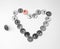 Stationery buttons are laid out in the shape of a heart with a point up, black and white photo with color accent