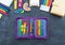 Stationery chalk board. Back to school.Girl open pencil case