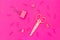 Stationery pink color on plastic pink background. Flat lay