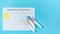 Stationery and planner on blue pastel background