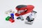 Stationery stapler, erasers, sharpeners on white background.