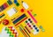 Stationery yellow background. Education. Training material for learning and creativity