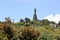 Statua San Michele on top of sardinian mountain landscape near Biddamanna Istrisàili Villagrande Strisaili Arzana, Italy