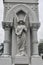 Statue of an Angel with Wings Spread in a Cemetery