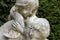 A statue of angels at bagatelle gardens in paris france